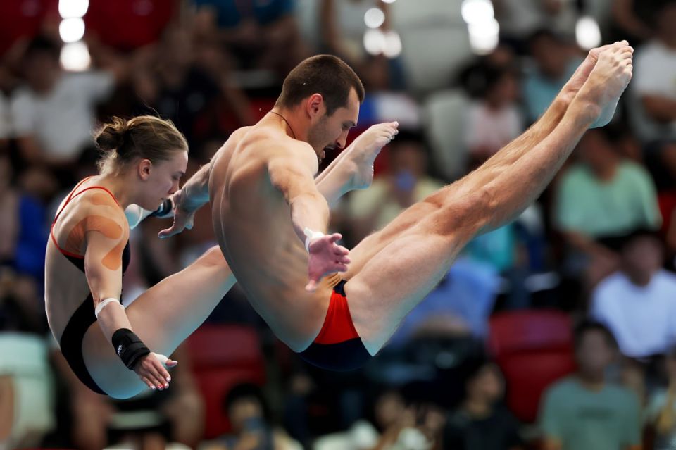 Александр Бондарь, выпускник Луганского высшего училища физической культуры и спорта, и Анна Конаныхина завоевали бронзу на чемпионате мира в Сингапуре