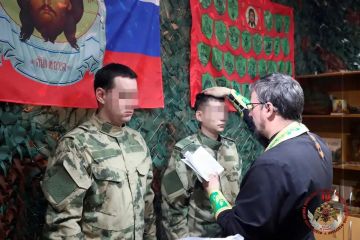 В ЛНР священнослужитель совершил таинство крещения росгвардейцев