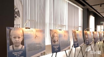 Жизнь в каждом кадре: выставка «Аллея ангелов» о погибших детях ЛНР открылась в Луганске